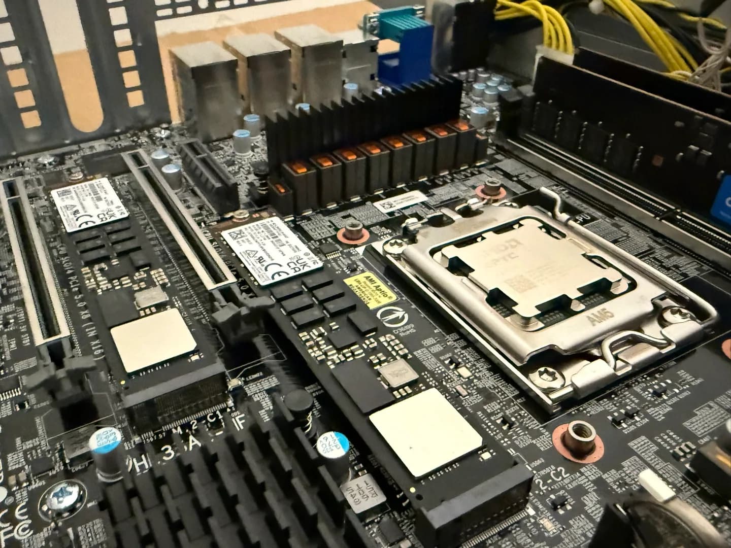 Motherboard with an installed processor and two NVMe SSDs in an open case